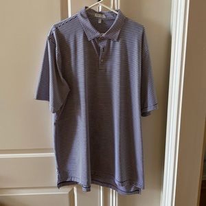 Peter Millarwith blue bird logo on sleeve